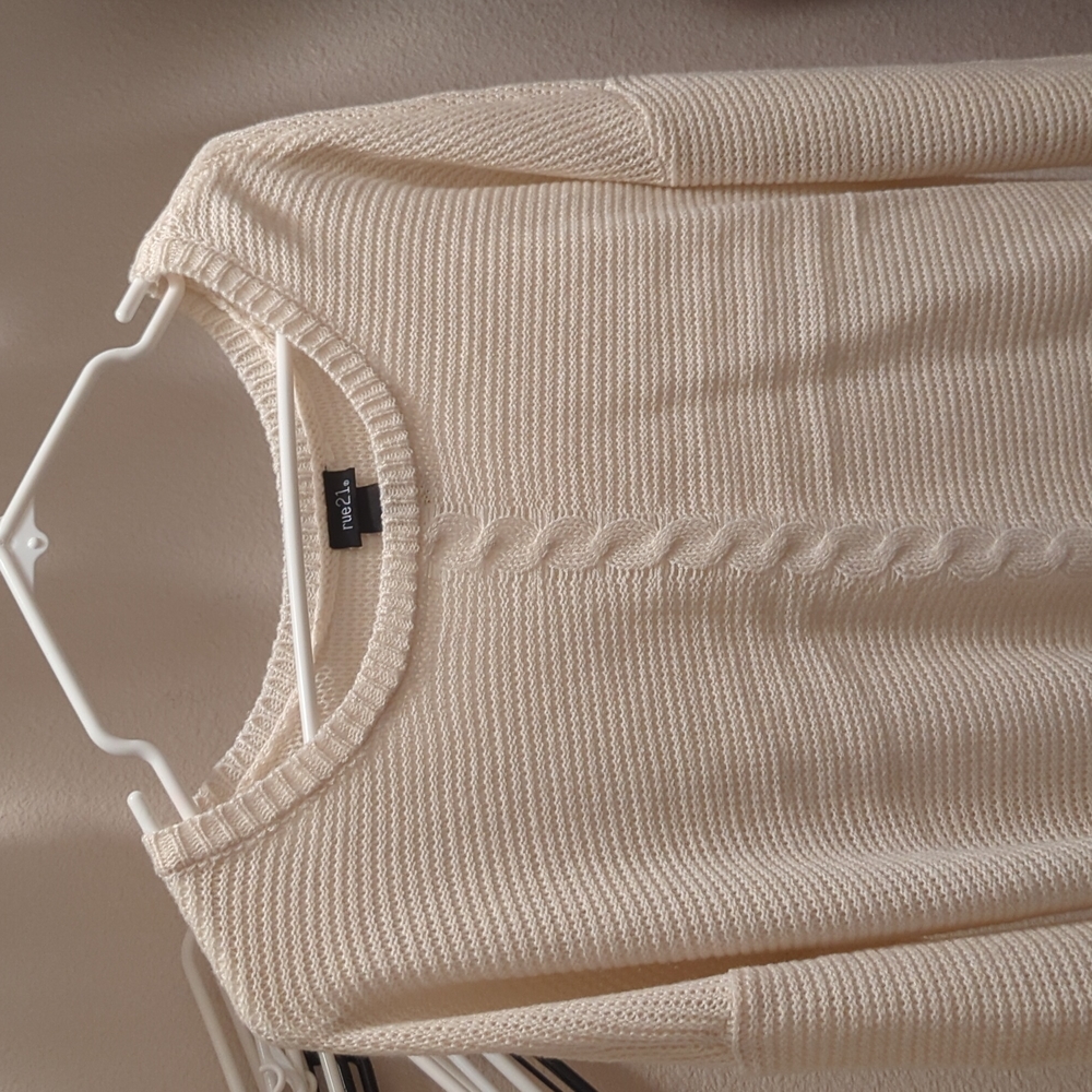 cream sweater